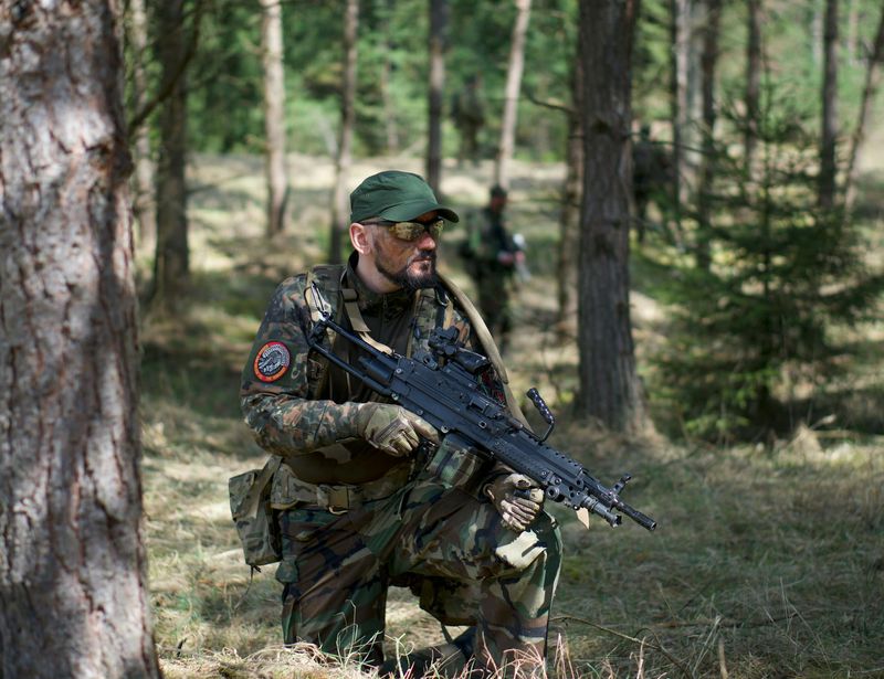 A man holding a plank position with focus and stability.
